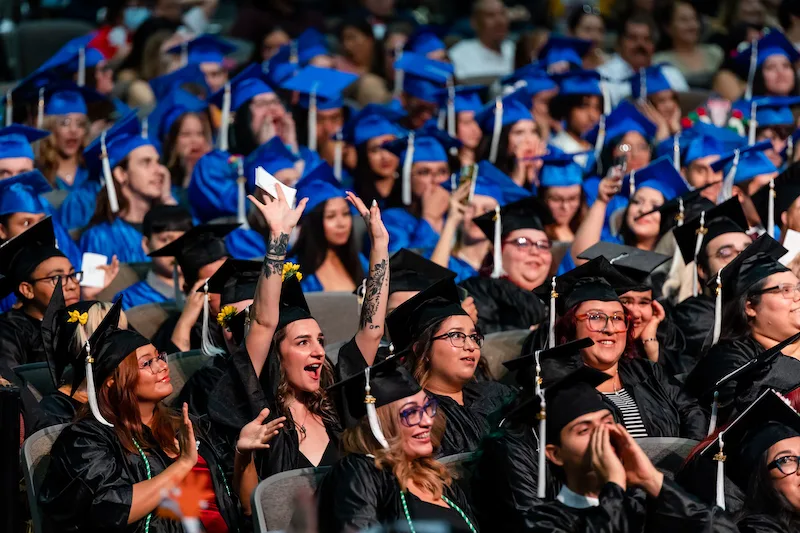 Students in audience moments before high school graduation